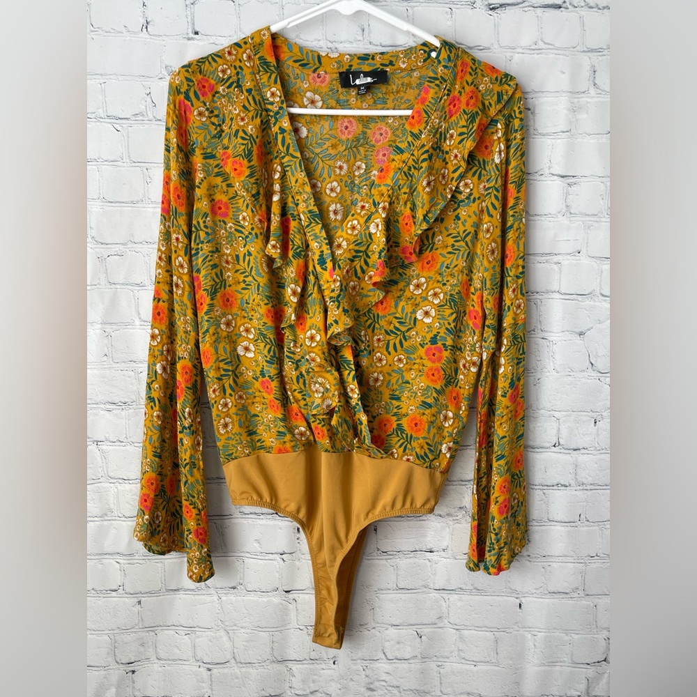Lulu’s size medium mustard colored with florals